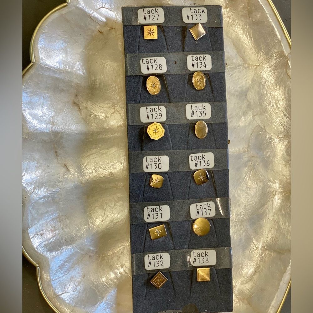 Natural Diamond in some and 10k gold. Listing is for ONE vintage tie tac.
